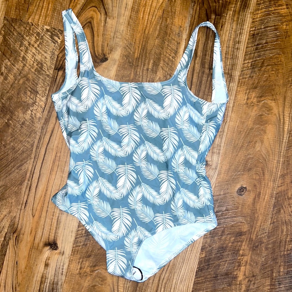 Brand new! Never worn, tags removed. Pink Lily one piece swimsuit
